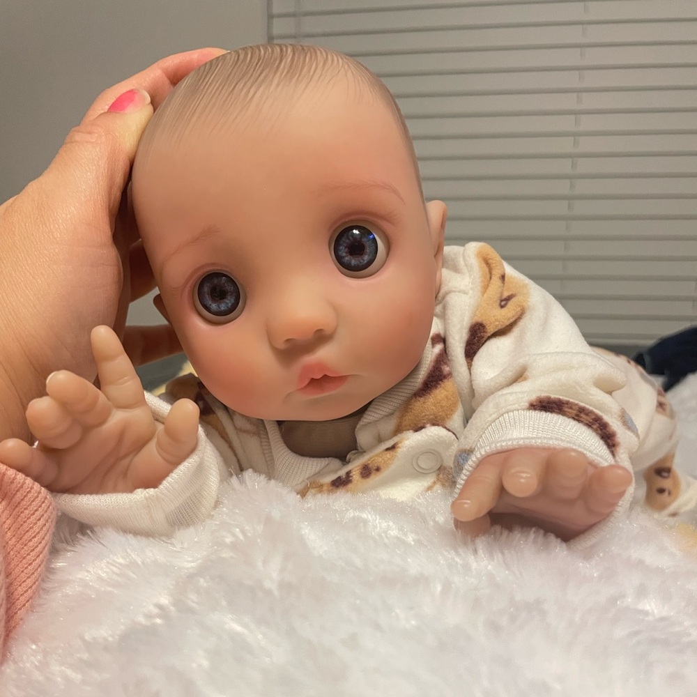 Reborn baby Peeka replica with belly plate